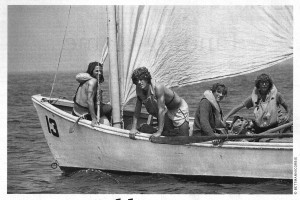 john kennedy jr in a pulling boat